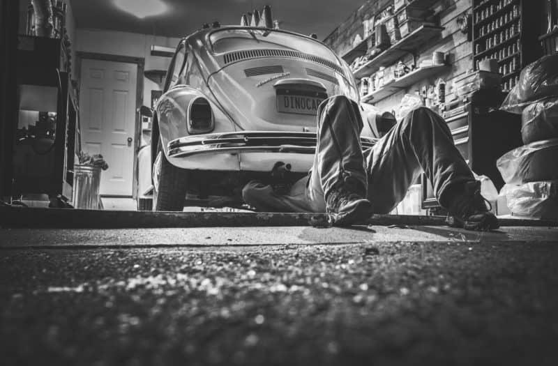 What are the Penalties for Stealing a Catalytic Converter in California? 1 A man under a VW bug, possibly to steal the catalytic converter